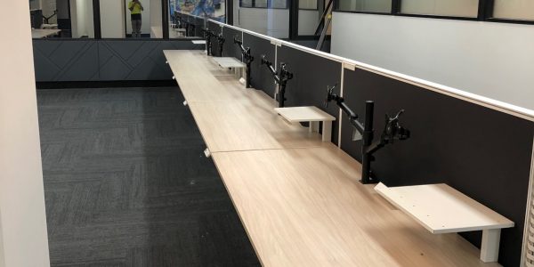 Installation of 200 Sit:stand workstations-Mariquino - Furniture installation melbourne