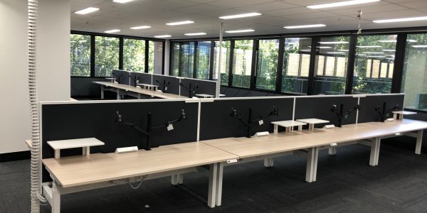 Installation of 200 Sit:stand workstations-Mariquino - Furniture installation melbourne